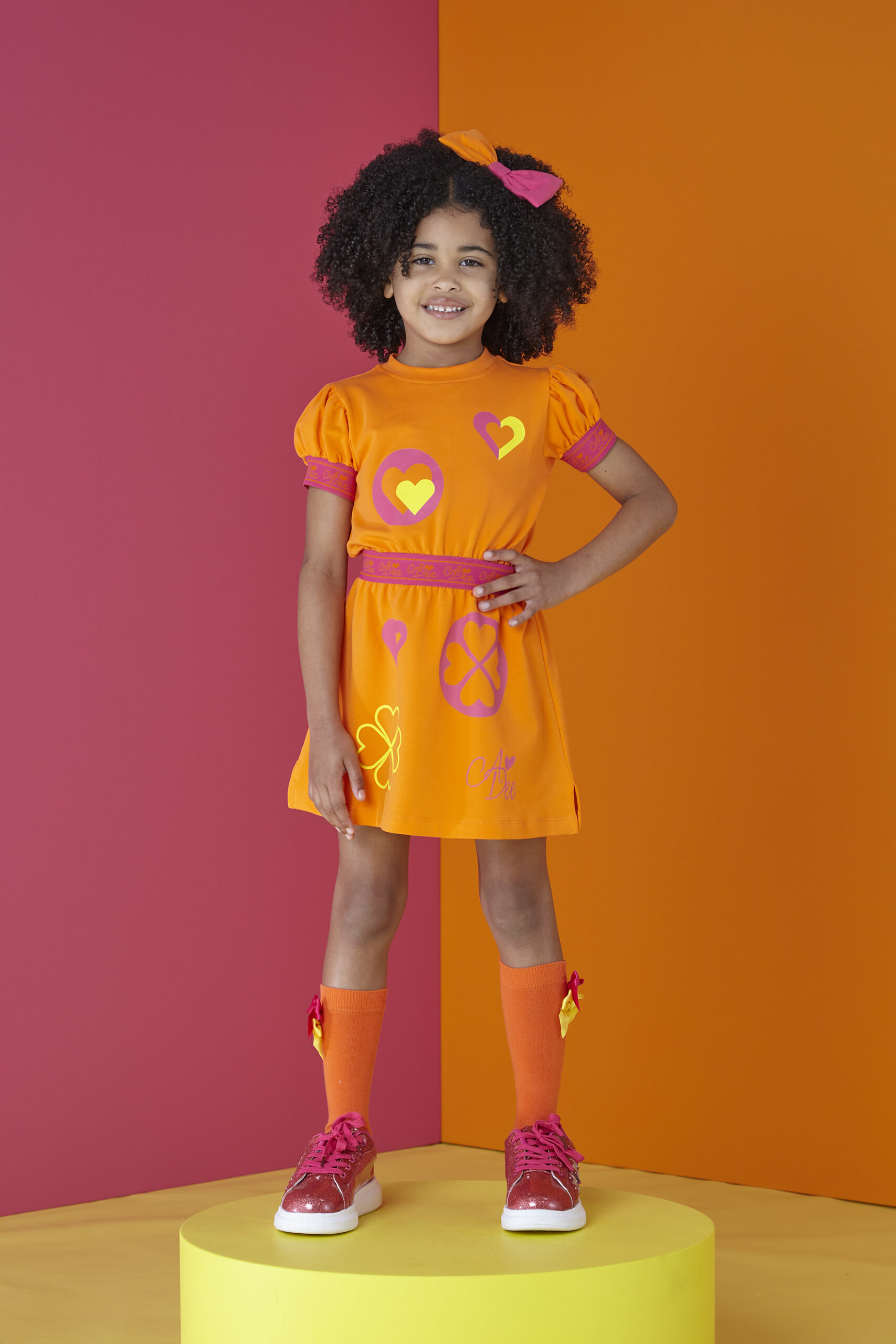 A’dee Millie oranje hot pink jurk met designs model 2